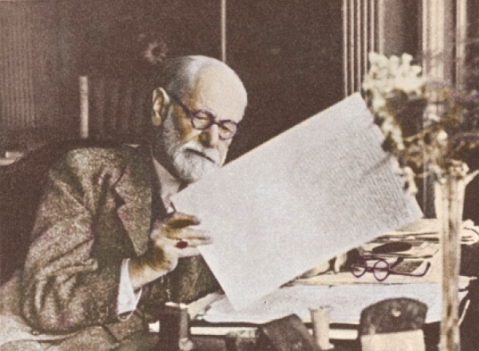 Freud reading his An Outline of Psycho-Analysis in July 1938